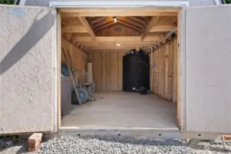 Outbuilding with NEW electrical sub-panel and NEW 500 gal water system.