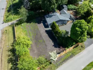 Nice corner lot with NEW roof, NEW 3/bed septic system and NEW cedar fence.