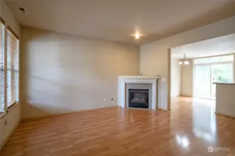 Laminate flooring spans the entire lower level, while a cozy gas fireplace adds warmth and comfort during those classic PNW days and nights.