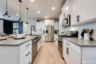 Photos of Model Home of Plan 2473 Elevation B at another community.  Details and colors will vary from home to home. No two homes are exact. Ask Broker for color selections for the listed property