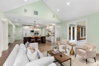 Family room, open to the kitchen and deck.