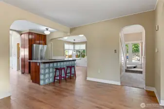 Eat in kitchen at the bar, engineered hardwood floors