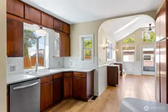 Amazing kitchen with lots of light, garden window, stainless appliances, and pantry.
