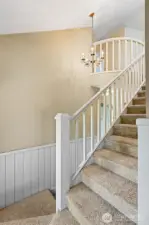 Beautiful split access stair case. Enter from the bedroom side or the dining room side.