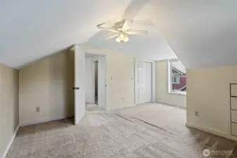 2nd floor bedroom with fan.