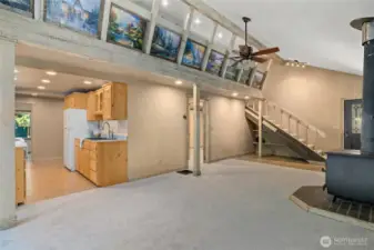 Large living room looking towards upstairs.