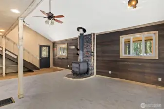Large living room with space for a dining room table in the corner.
