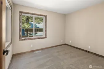 Downstairs Den/Office, just off the kitchen.  Could also be used as a dining room.