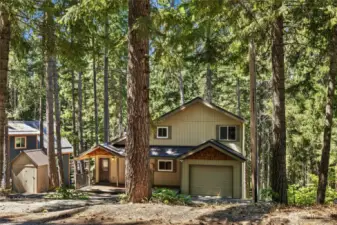 View of the home from W. Lakedale Dr.  Notice the woodshed to the left - it's full of seasoned wood for cozy fires all winter long!