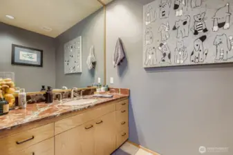 Powder room just off the great room kitchen.