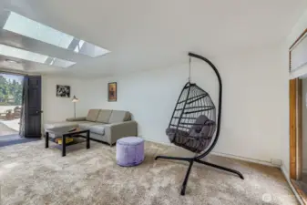 One level up is bonus space. You decide if it's a game room, TV/Movie room or another bedroom as it does have a closet. The door on the left accesses the rooftop deck.