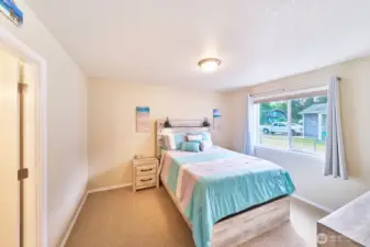 Primary suite has an adjoining full bath and walk-in closet.