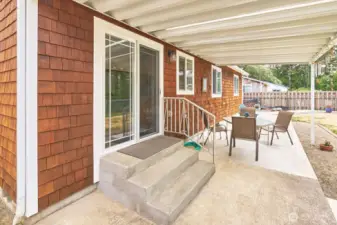 Slider off kitchen/dining area makes backyard BBQs a breeze.
