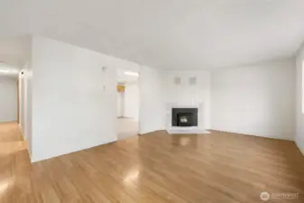 Large living space with wood fireplace to keep you warm on chilly nights.