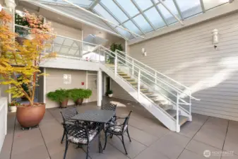 Resort style entry is covered and a great place to sit outside.
