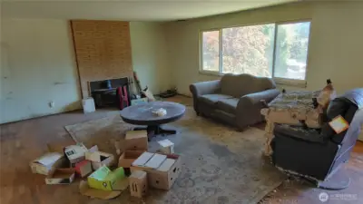 Living Room off front door entry with fire place