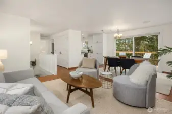 This view showcases the great flow from the main living space to the dining, kitchen and deck areas.