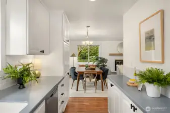 This view highlights the easy flow from the kitchen to dining area.