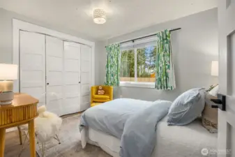 The third bedroom is equally spacious and bright and also overlooks the backyard.