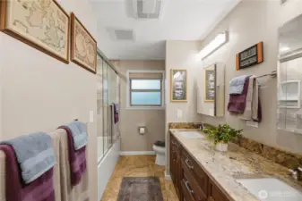 Main fl bath 2 deep tub and great shower, dual sinks