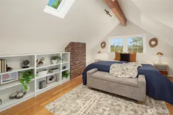 The primary bedroom is huge and has a gorgeous walk in closet and plenty of built in shelving.