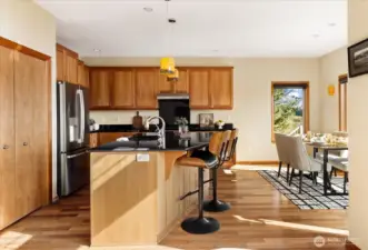 Utilize the large island for prepping, eating, and entertaining.