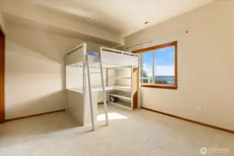 Lower floor bedroom with water views and walk in closet.