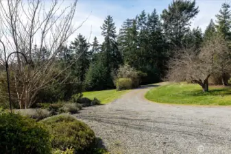 The long driveway brings privacy and peace. Neighbors are welcome, but not seen or heard.