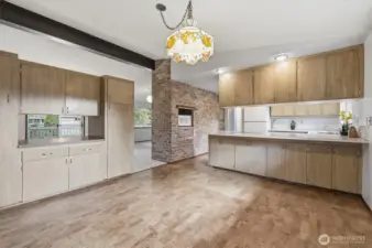 Huge Eating are off eating bar w/access  to screen room - Cabinet on left will be removed if requedsted.