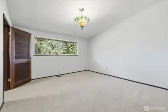 Upper primary bedroom w/walk in closet.