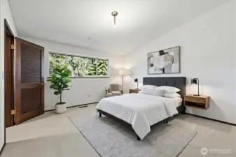 Virtually staged furniture ideas in primary bedroom.