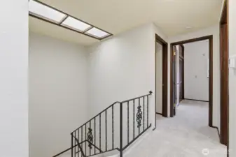 Upperhall off entry andsHuge laundry Main hallway off foyer and stairs leading to basement.