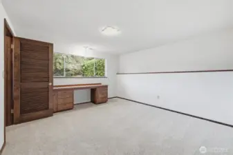 Lower back left bedroom with walk-in closet and more built in desk space.