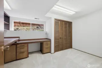 Downstairs back Office/den/Hobbyroom with tons of custom built-ins.