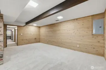 This recroom area could easily incorporate a small kitchen/dining area as it is plumbed  for water.