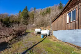 side yard and oil tanks for furnace