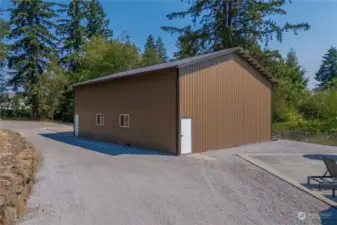 Heated 36x48 Detached shop/garage with RV parking inside and enough room for 8 cars.