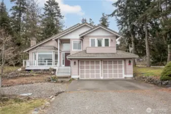 Wood exterior, tile roof, trek-like deck, freshly remediated crawlspace, updated appliances, including brand-new washer & dryer, newer induction stove and fresh paint await you at 281 Port Townsend Bay Road in Port Hadlock.