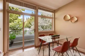 Casual eating nook with slider to balcony.