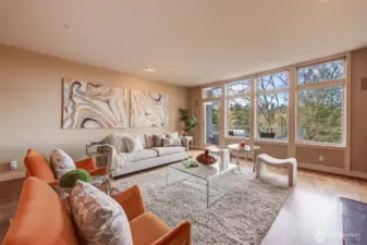 Access to the front balcony from the light filled living room.