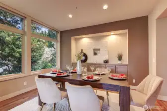 Formal dining area with built-in buffet cabinet.