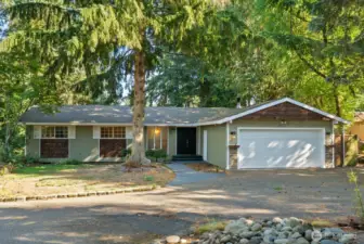 FRESHLY PAINTED EXTERIOR AND BRAND NEW GARAGE DOOR!