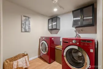 LAUNDRY ROOM OUT OF THE WAY SO NO ONE SEES YOUR LITERAL DIRTY LAUNDRY. WASHER AND DRYER STAY WITH HOME