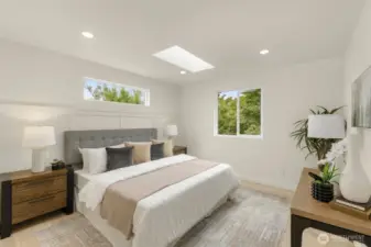 Upstairs a peaceful primary retreat—wake up to light and tranquility.