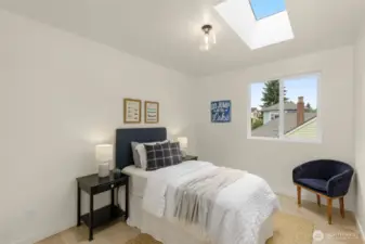 A third spacious bedroom, offering calm and comfort on the top floor.