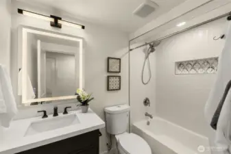 Crisp bathrooms showcase quality craftsmanship throughout the home.