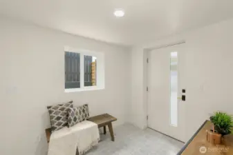 Welcoming second entrance that sets the tone for what’s inside.