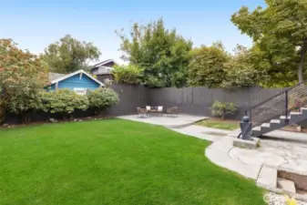 Lush yard—fully fenced for privacy, pets, and play.