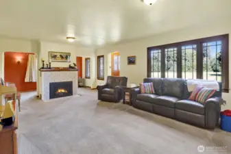 Inside find a lovingly maintained home with many original features including original hardwood flooring below the living room carpet