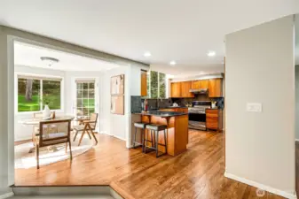 Refinished hardwood flooring flows from the foyer to through the home to the kitchen, family room & breakfast nook.